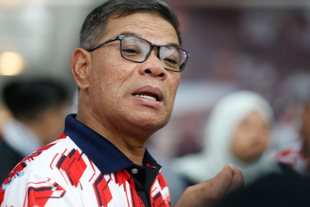 Home Minister Datuk Seri Saifuddin Nasution Ismail speaks to the media at the Community Safety Run in conjunction with the 217th Police Day in Putrajaya, on July 6, 2024. — Picture by Raymond Manuel