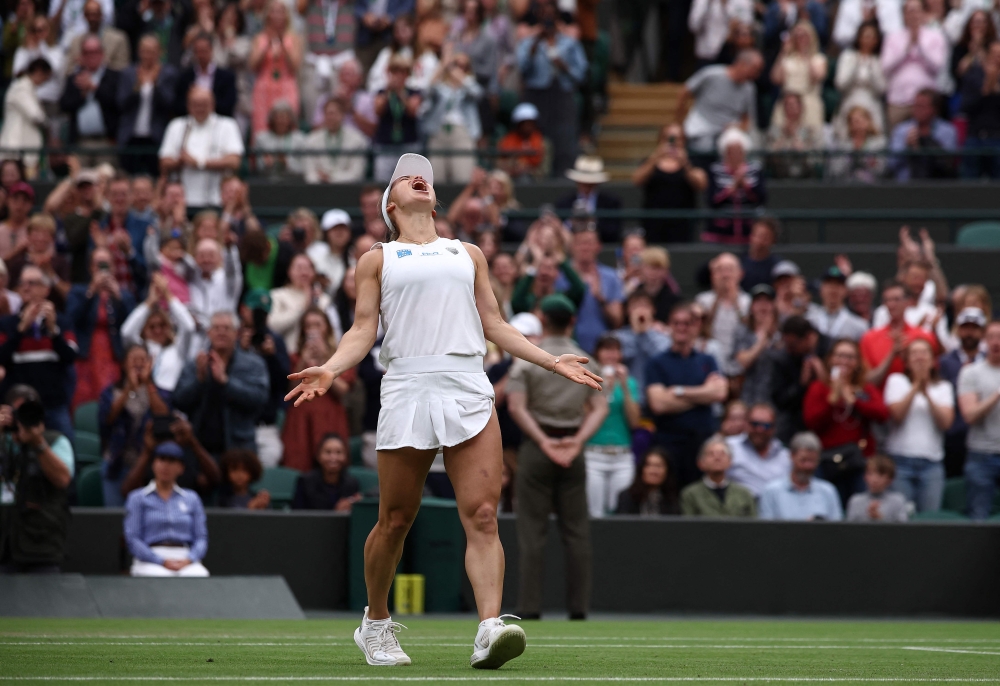 Kazakhstan's Yulia Putintseva celebrates winning against Poland's Iga Swiatek during their women's singles tennis match on the sixth day of the 2024 Wimbledon Championships at The All England Lawn Tennis and Croquet Club in Wimbledon July 6, 2024. — AFP pic