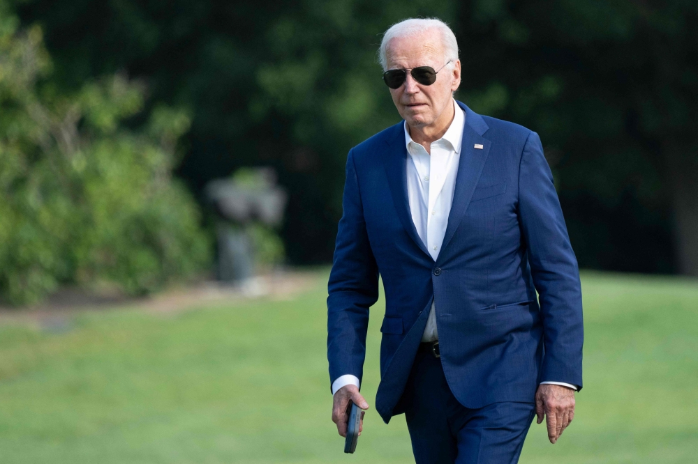 As US President Joe Biden arrived in the state capital Harrisburg, reporters shouted questions including whether the Democratic Party was behind him, to which the president grinned and loudly responded: 'Yes.' — AFP pic