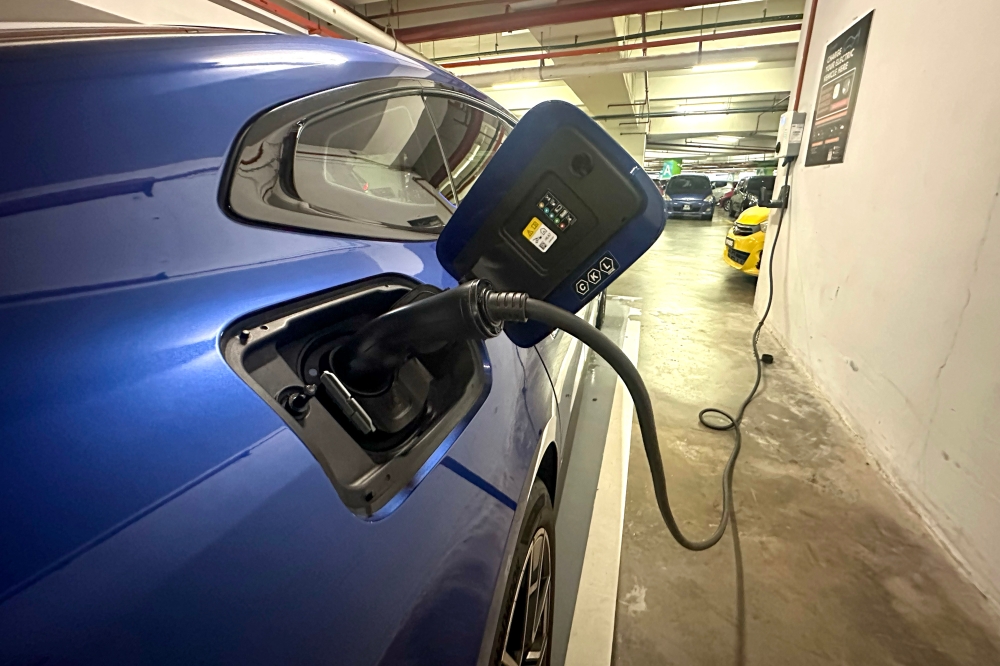 File picture of an electric vehicle charging at EV charging station in Putrajaya, June 18, 2024. — Picture by Shafwan Zaidon