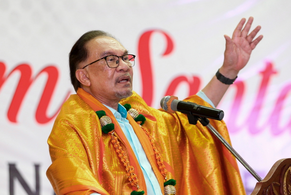 Prime Minister Datuk Seri Anwar Ibrahim speaks during the ‘Santai Bersama Komuniti India Parlimen Tambun’ programme in Ipoh July 8, 2024. — Bernama pic