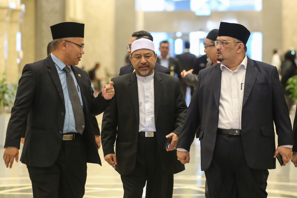 Kelantan Deputy Menteri Besar Datuk Mohamed Fadzli Hassan (right) said Kelantan is planning to process non-radioactive rare earth elements itself. — Picture by Yusof Mat Isa