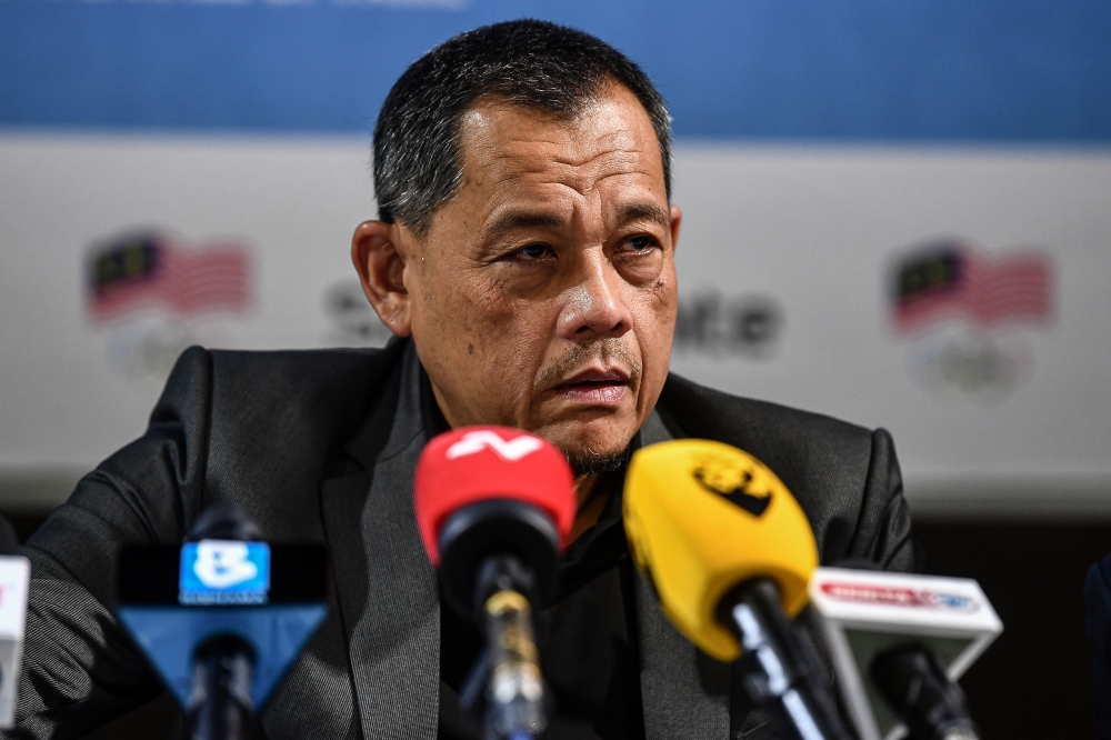 Chef de mission (CDM) of 2024 Olympics Malaysian Contingent Datuk Mohd Hamidin Mohd Amin speaks to the media in Kuala Lumpur, July 9, 2024. — Bernama pic 