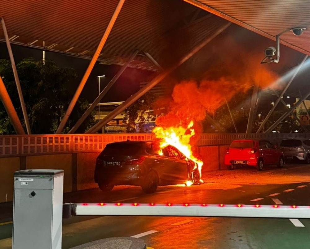 The police have today confirmed that an incident where a car that caught fire at the Bangunan Sultan Ibrahim in Johor Baru that was seen in a viral video. — Picture via Facebook/Johor Baru Selatan police