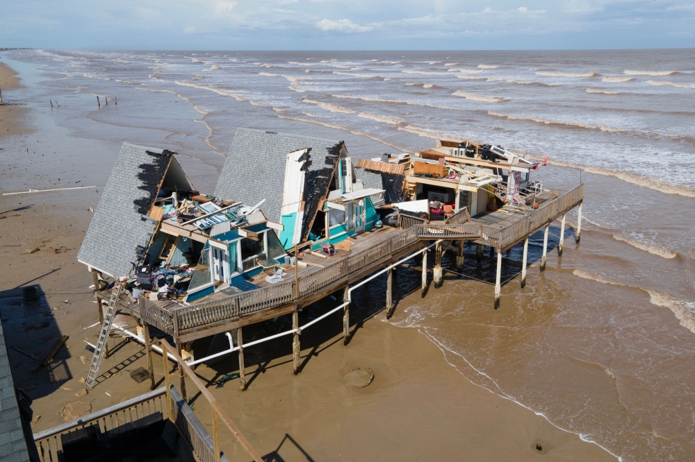 At least eight people were killed in the southern United States after storm Beryl felled trees and caused heavy flooding, before being downgraded to a post-tropical cyclone yesterday. — AFP pic