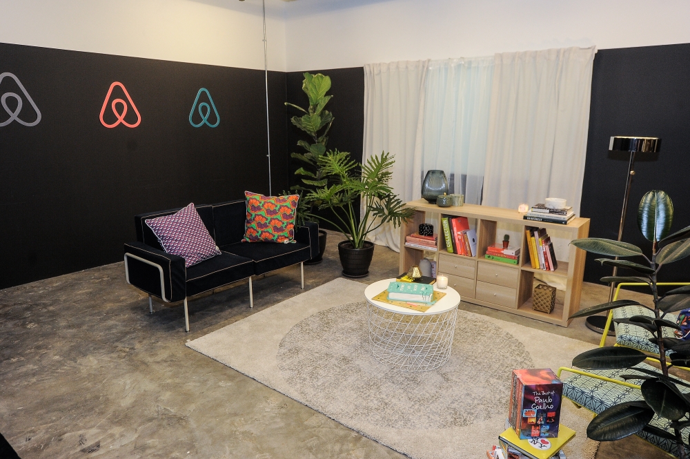 This 2018 file photograph shows Airbnb logos at an exhibit in Cyberjaya. — Picture by Shafwan Zaidon