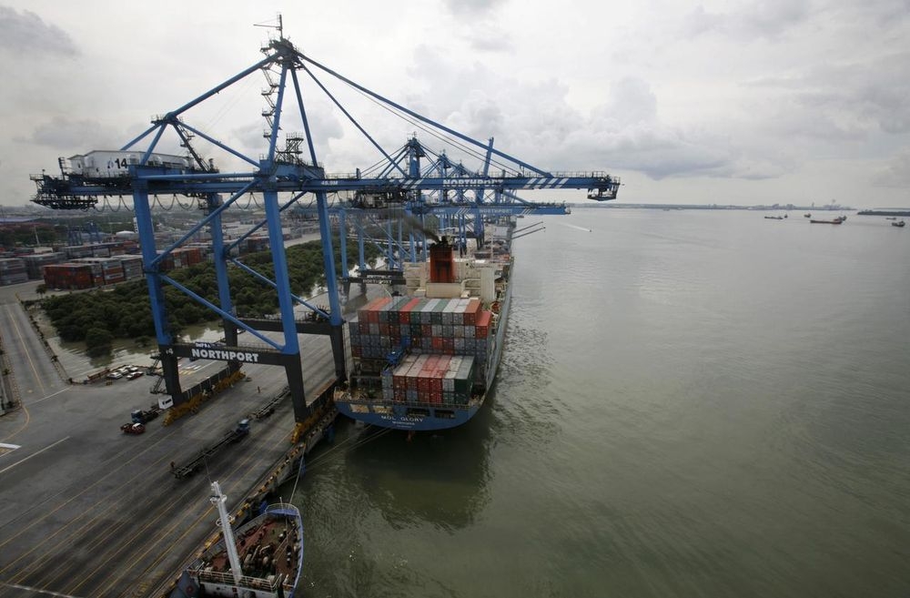 File picture shows a container ship being anchored at North Port in Port Klang. — Reuters pic