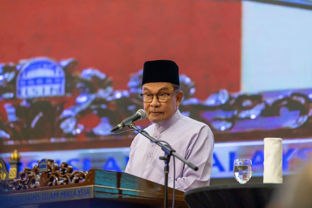 Prime Minister Datuk Seri Anwar Ibrahim delivers a speech at the World Trade Centre in this July 4, 2024 photograph. — Picture by Raymond Manuel