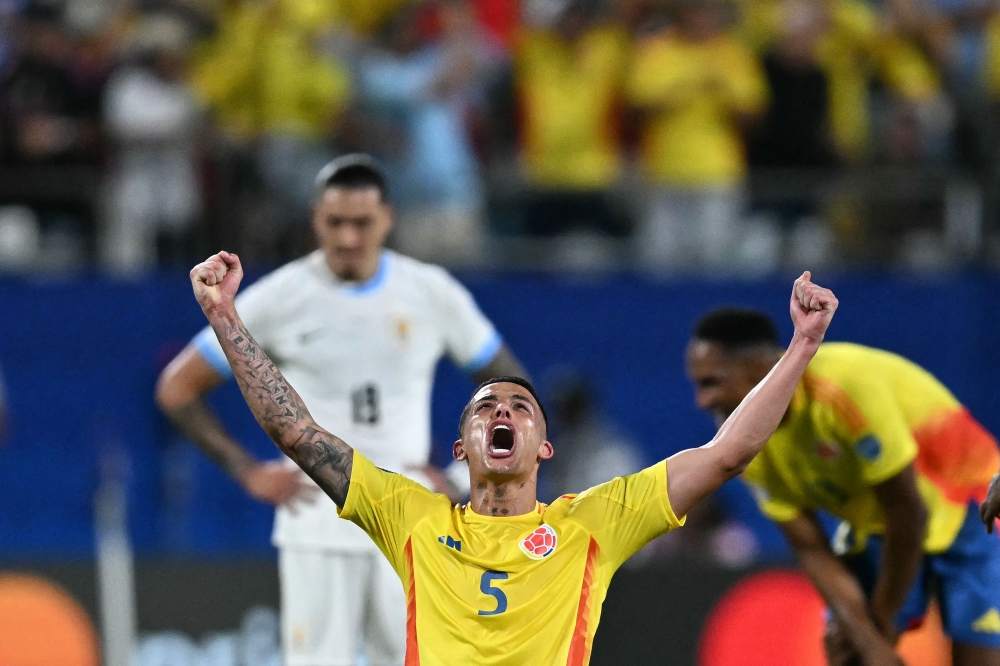 TOPSHOT - Colombia's midfielder #05 Kevin Castano celebrates his team's victory in the Conmebol 2024 Copa America tournament semi-final football match between Uruguay and Colombia at Bank of America Stadium, in Charlotte, North Caroline on July 10, 2024. — AFP pic