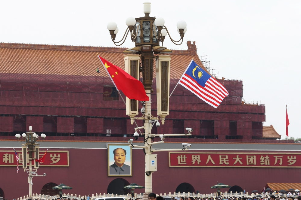 According to the Ministry of Investment, Trade and Industry (Miti), the uncertainty in US-China trade relations will encourage multinational companies from other nations to seek alternative production locations in third countries, including Malaysia. — Picture by China Out via Reuters