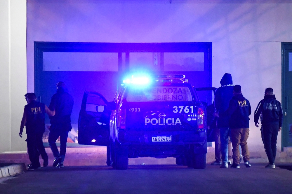 Detained French rugby players Oscar Jegou and Hugo Auradou arrive at the justice department in Mendoza, Argentina July 11, 2024. — Reuters pic 