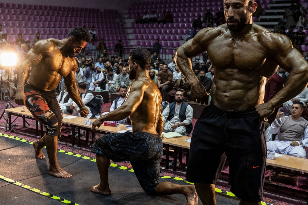 Afghan bodybuilders compete in the Mr Afghanistan bodybuilding competition in Kabul on July 10, 2024. — AFP pic 