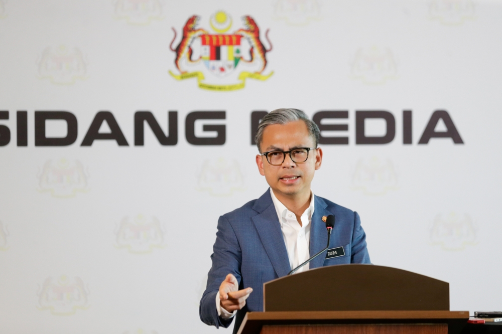 Communications Minister Fahmi Fadzil holds a press conference at the Communications Ministry in Putrajaya on July 12, 2024. —Picture by Raymond Manuel