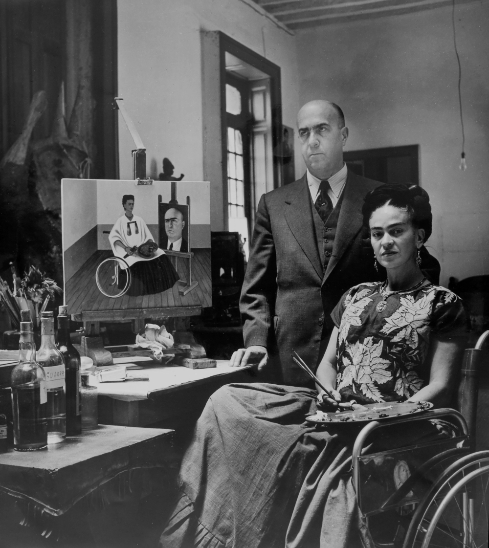 Frida and Dr Juan Farill with her self-portrait. — Picture by Gisele Freund