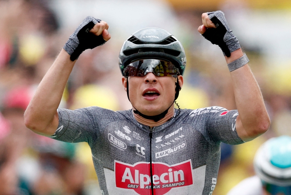 Deceuninck's Jasper Philipsen celebrates winning stage 13 after Tour de France stage 13 from Agen to Pau July 12, 2024. — Reuters pic  