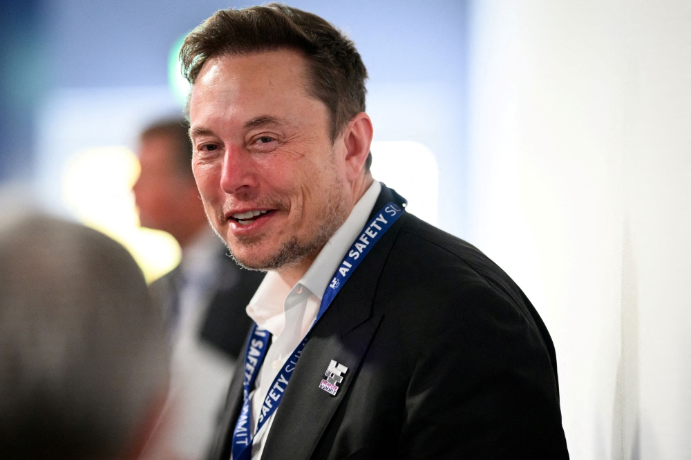Billionaire Elon Musk has donated to a political group working to elect rival presidential candidate Donald Trump, Bloomberg reported yesterday. — Leon Neal/Pool/Reuters pic