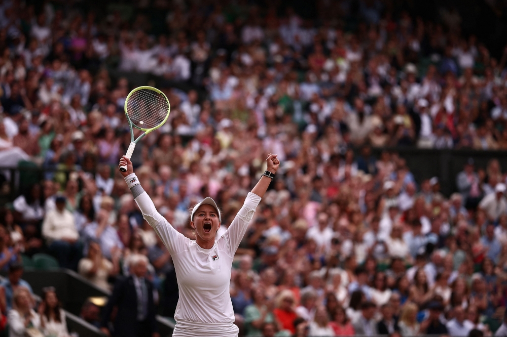 Czech Republic’s Barbora Krejcikova celebrates winning against Kazakhstan’s Elena Rybakina during their women’s singles semi-final tennis match on the eleventh day of the 2024 Wimbledon Championships at The All England Lawn Tennis and Croquet Club in Wimbledon July 11, 2024. — AFP pic