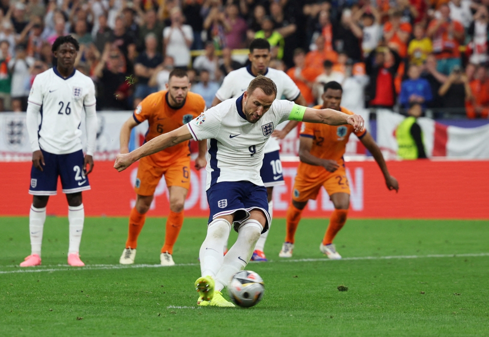 England’s Harry Kane scores their first goal from the penalty spot in the semi-final match against the Netherlands at Dortmund BVB Stadion, Dortmund, July 10, 2024. — Reuters pic 