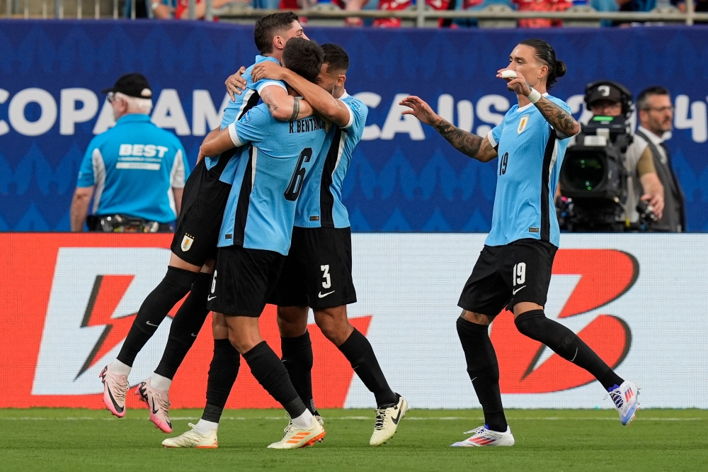 Uruguay midfielder Rodrigo Bentancur (6) celebrates his goal with his teammates against Canada during the first half at Bank of America Stadium. — Jim Dedmon-USA TODAY Sports pic via Reuters 