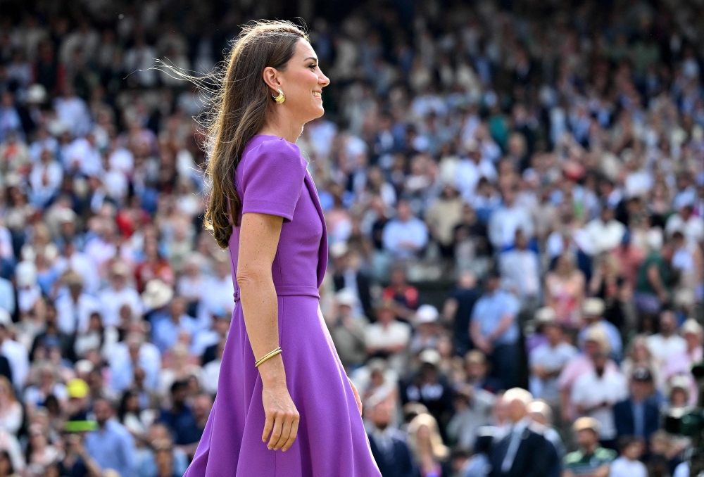 The Princess of Wales reacts to the crowd at Wimbledon during the trophy ceremony at the end of the men’s singles final tennis match between Spain’s Carlos Alcaraz and Serbia’s Novak Djokovic. — AFP pic