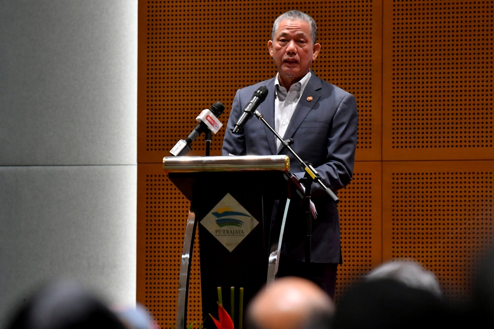Deputy Prime Minister Datuk Seri Fadillah Yusof delivers a speech at the 1st National Seminar on Microplastics in Putrajaya, July 15, 2024. — Bernama pic 