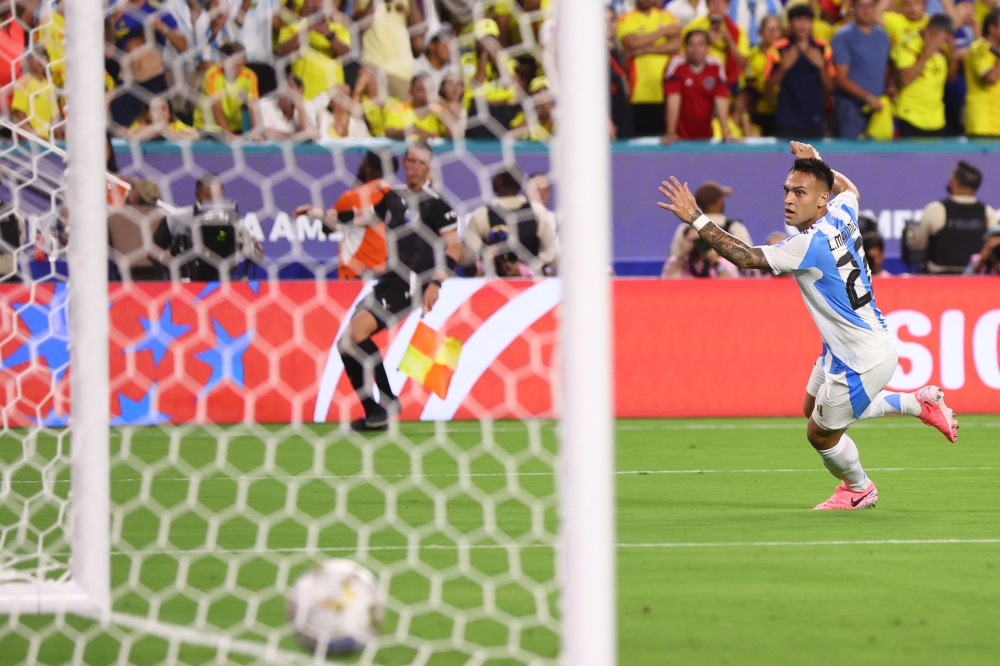 Argentina’s Lautaro Martinez of Argentina celebrates after scoring the team’s first goal during the Copa America 2024 final match against Colombia at Hard Rock Stadium on July 14, 2024 in Miami, Florida. — AFP pic