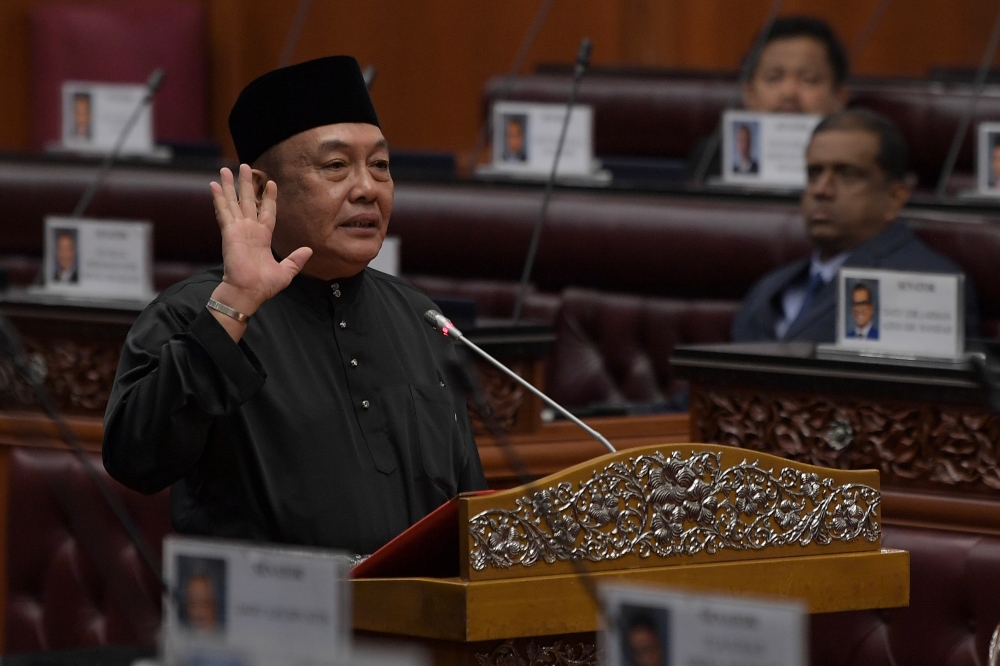 Datuk Awang Bemee Awang Ali Basah takes the oath of office as a Senator before Dewan Negara Deputy President Datuk Nur Jazlan Mohamed, July 15, 2024. He was appointed by the His Majesty Sultan Ibrahim, King of Malaysia, for the period starting today until July 14, 2027. — Bernama pic 