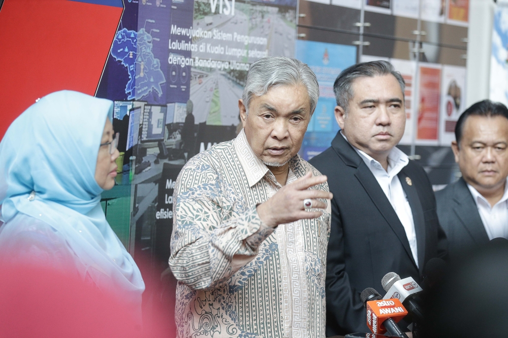 Deputy Prime Minister Datuk Seri Ahmad Zahid Hamidi with Federal Territory Minister Dr Zaliha Mustafa, Transport Minister Anthony Loke and Works Minister Datuk Seri Alexander Nanta Linggi during a press conference at the Kuala Lumpur Command and Control Centre, July 15, 2024. — Picture by Sayuti Zainudin