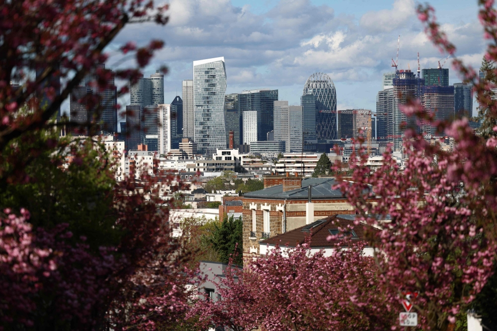 The French financial district La Defense is seen from Saint Cloud, Paris on April 3, 2024. France, the euro zone's second biggest economy, is at high risk of macroeconomic shocks due to delays in structural reform. — AFP pic