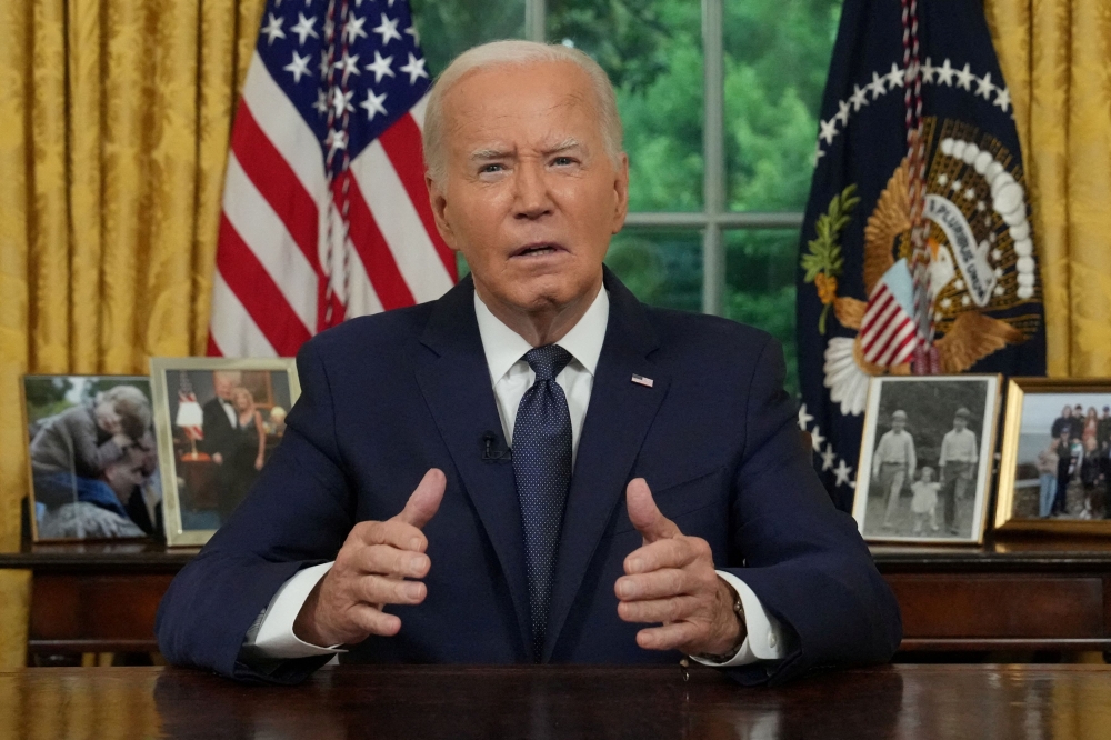 US President Joe Biden, 81, is under continued pressure and scrutiny from some lawmakers, donors and activists to drop his reelection campaign in the wake of his disastrous presidential debate performance, which renewed questions about his mental fitness. — Pool via Reuters pic