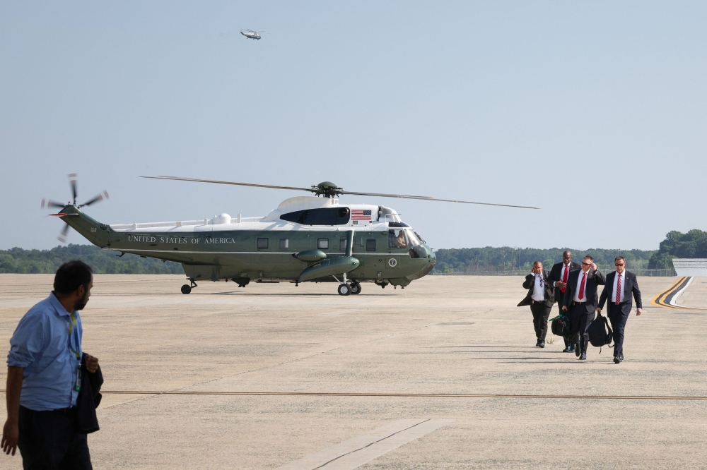 US Secret Service Agents exit a helicopter at Joint Base Andrews in Maryland July 15, 2024. — Reuters pic  