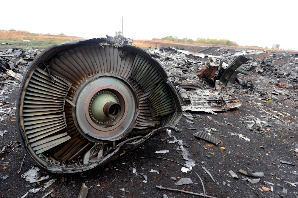 This file photo taken on September 9, 2014 shows part of the Malaysia Airlines Flight MH17 at the crash site in the village of Hrabove (Grabovo), some 80km east of Donetsk. — AFP pic