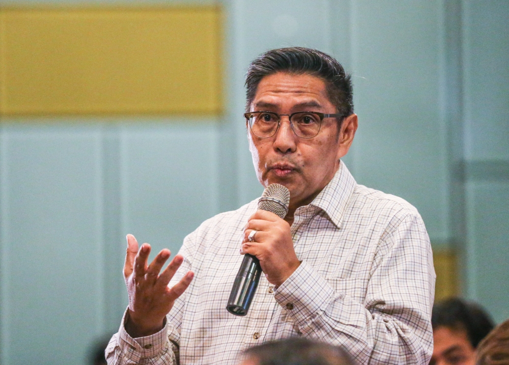 Azharuddin said that he was one of the first individuals to listen to the black box recording of MH17. — Picture by Firdaus Latif