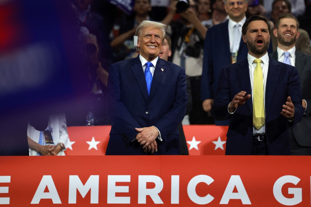 Former US president Donald Trump (left) is seen with his running mate JD Vance at a Republican National Convention on July 16, 2024 in Milwaukee, Wisconsin. — AFP pic