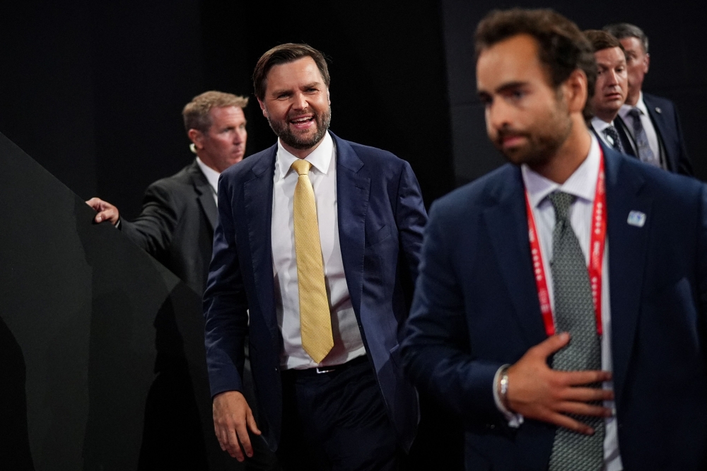 US vice-president candidate and techie JD Vance (centre, in yellow tie) is seen at the Republican National Convention on July 16, 2024 in Milwaukee, Wisconsin. — Reuters pic