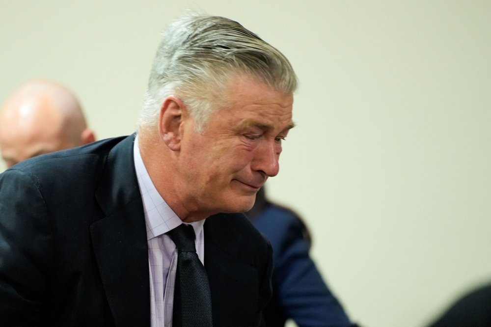 Alec Baldwin has informed a New Mexico state prosecutor and sheriff he may sue them after it emerged they withheld evidence from his defence team during their botched attempt to prosecute him over a fatal shooting on the movie set for ‘Rust’. — Reuters pic