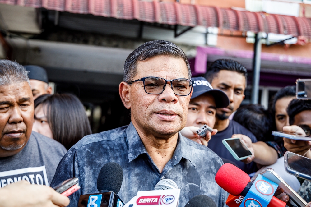 Home Minister Datuk Seri Saifuddin Nasution speaks to reporters at Flat Sri Kelantan in Kuala Lumpur. July 18, 2024. — Picture by Firdaus Latif