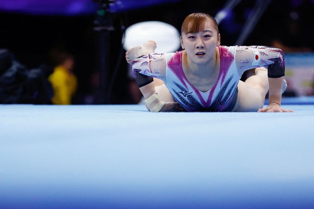 Japan's Shoko Miyata falls as she competes in the Women's Team Final during the 52nd FIG Artistic Gymnastics World Championships, in Antwerp, northern Belgium, on October 4, 2023. Japanese gymnast Shoko Miyata has been sent home from the Paris Olympics over allegations of smoking, local media reported today. — AFP pic