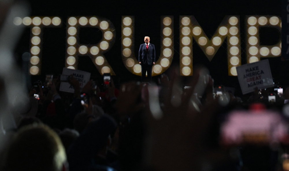Republican presidential nominee and former US President Donald Trump takes the stage on Day 4 of the Republican National Convention (RNC), at the Fiserv Forum in Milwaukee, Wisconsin July 18, 2024. — Reuters pic