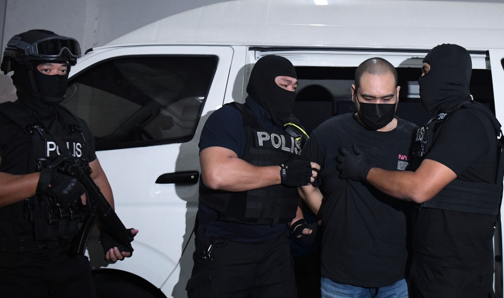 Muhammad Zul Khairi Mohamad Nasir, 33, being taken to the Sessions Court in Butterworth, July 19, 2024. — Bernama pic 