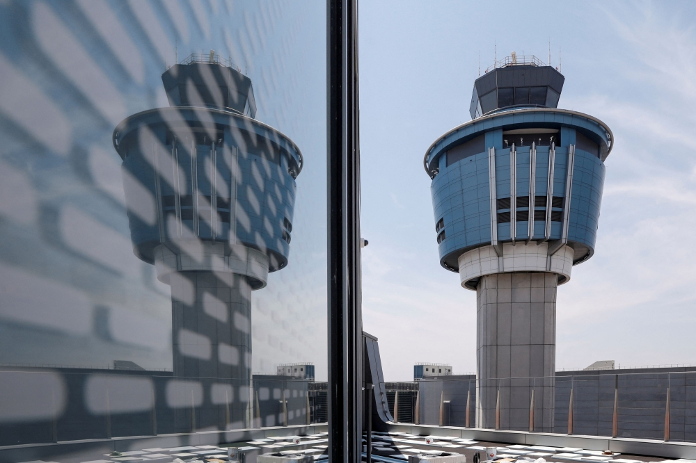 The Control tower is seen at New York's LaGuardia Airport's newly renovated Terminal B in New York City, New York June 10, 2020. Major US air carriers including Delta, United and American Airlines grounded all flights early today over a communication issue, according to the Federal Aviation Administration. — Reuters pic  