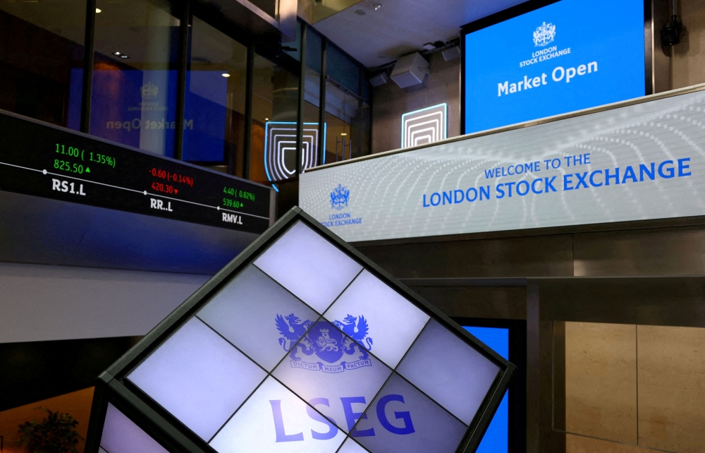 LSEG signage is seen on screens in the lobby of the London Stock Exchange in London May 14, 2024. — Reuters pic  