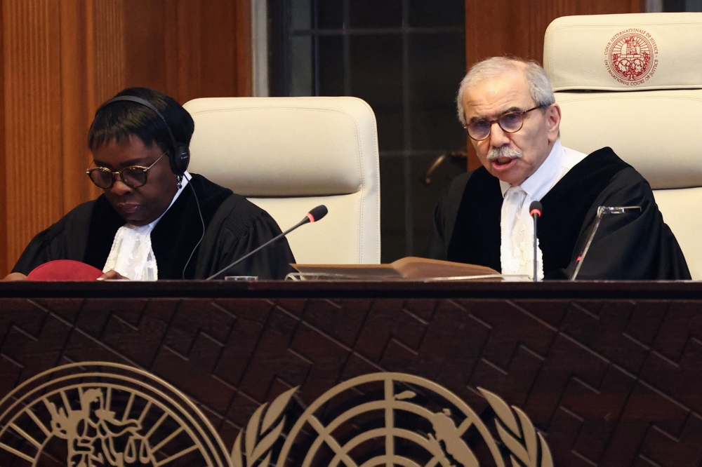 Judge Nawaf Salam (R), president of the International Court of Justice (ICJ) said Israel must end the occupation as rapidly as possible. — Reuters pic