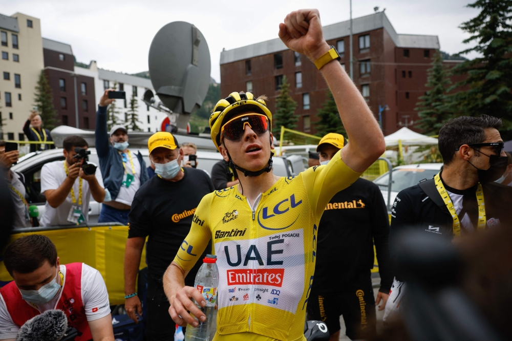 Tadej Pogacar is two stages away from a Giro d’Italia and Tour de France double. — AFP pic