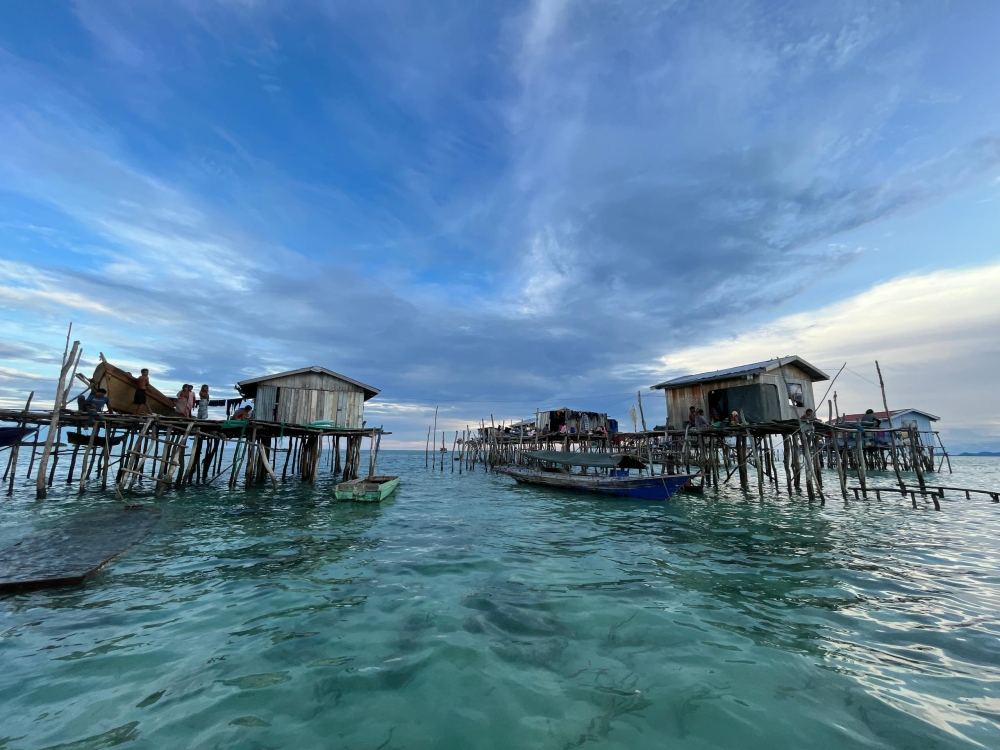 The traditional homes of the Bajau Laut are built on high stilts over the sea to withstand the changing currents. — Picture courtesy of Iskul Sama DiLaut Omadal