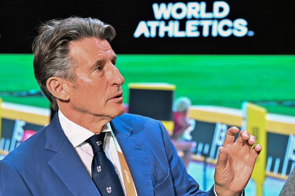 Re-elected World Athletics President Sebastian Coe from Britain gestures as he addresses a session on the second day of the World Athletics Congress at the main hall of the Hungexpo, the Hungarian Exhibition and Fair Center in Budapest on August 18, 2023. Coe has proven to be his own man throughout his life but he told AFP he has never worried about doing what he thinks is right ‘even if it means temporary or long-term unpopularity.’ — AFP pic
