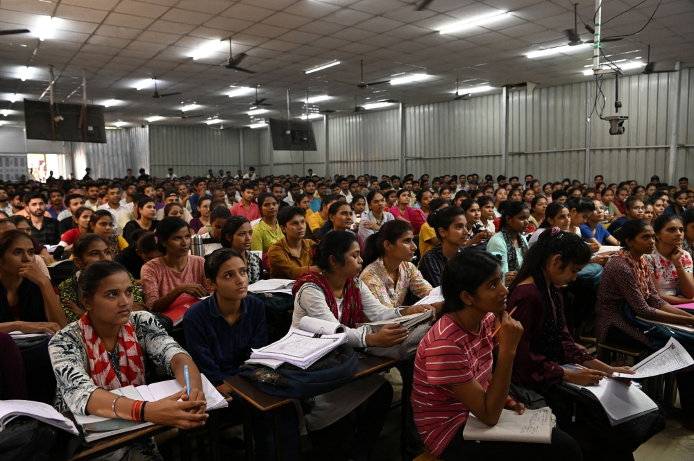 Students attend a class at Super Climax Academy, a coaching institute training students to secure government jobs, in Prayagraj, India, June 19, 2024. — Reuters pic  