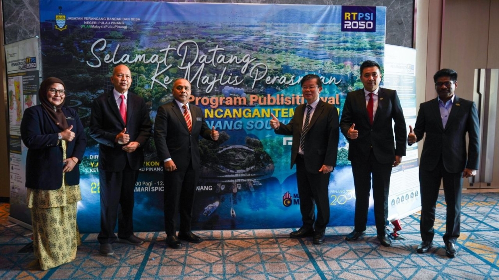Penang Chief Minister Chow Kon Yeow (third from right) and state exco Jason H’ng (second from right) at the launch of the preliminary publicity of the Penang South Island 2050 local plan on July 22, 2024. — Picture courtesy of Penang Infrastructure Corporation