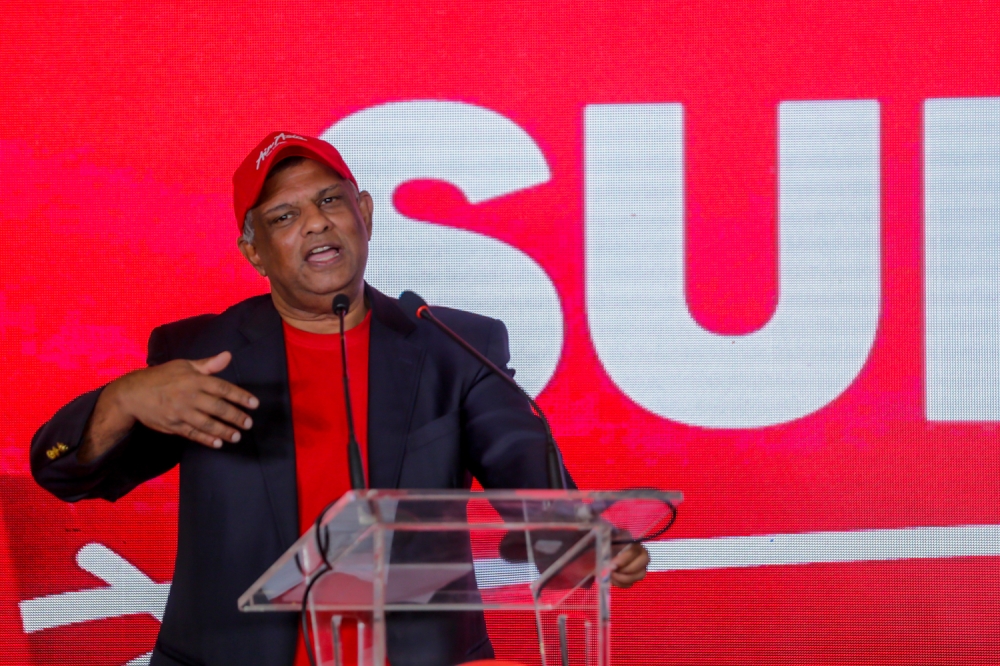Airasia Chief Executive Officer Tan Sri Tony Fernandes delivers his speech during the launch of new flights to Sabah and Sarawak from Sultan Abdul Aziz Airport, Subang. July 23, 2024 — Picture by Raymond Manuel