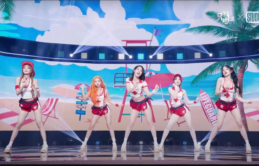 G-Idle was criticised for using the Red Cross logo in their stage outfits. — YouTube screenshot/KBS 